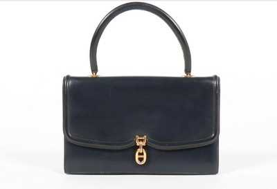 Lot 89 - An Hermès navy box calf leather handbag, 1960s,...