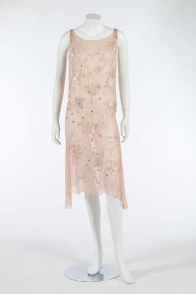 Lot 109 - A floss silk embroidered pale pink chiffon...