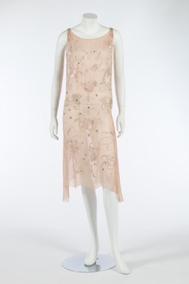 Lot 109 - A floss silk embroidered pale pink chiffon...