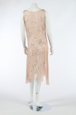 Lot 109 - A floss silk embroidered pale pink chiffon...