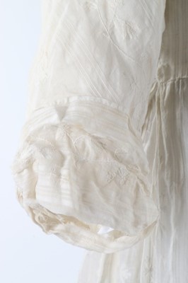 Lot 119 - A whitework embroidered empire-line muslin...