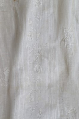 Lot 119 - A whitework embroidered empire-line muslin...