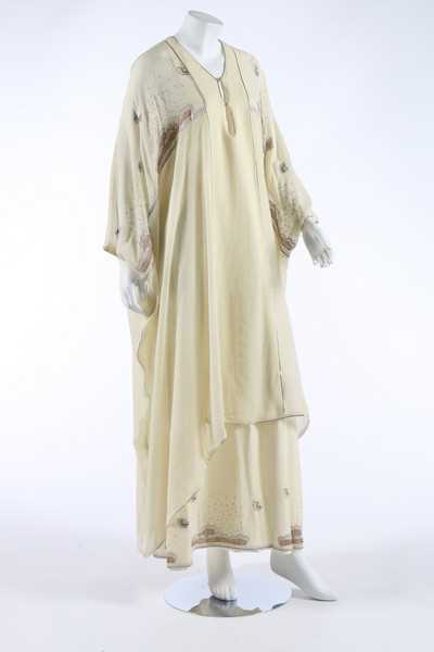 Lot 68 - A Janice Wainwright ivory chiffon kaftan-style...