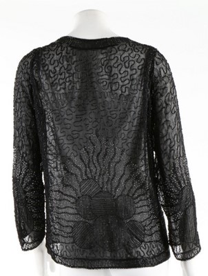 Lot 135 - A beaded black muslin flapper dress, circa...