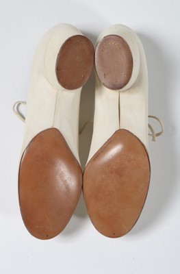 Lot 131 - A pair of Ferragamo 'Ferrina' white suede...