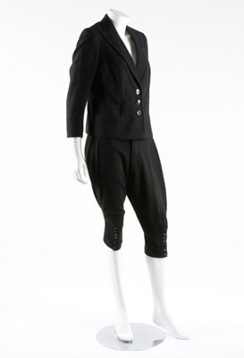 Lot 174 - A woman's double breasted day coat circa 1895,...