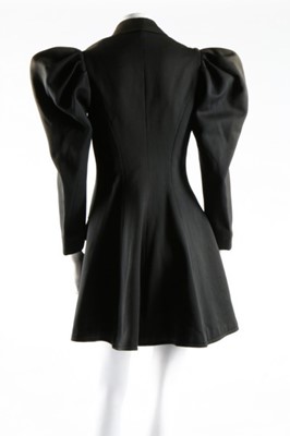 Lot 174 - A woman's double breasted day coat circa 1895,...