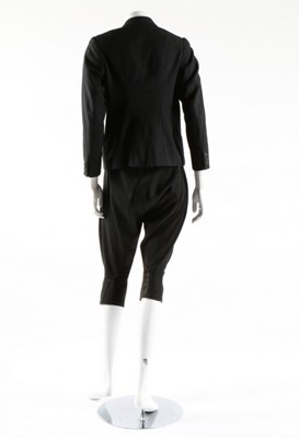 Lot 174 - A woman's double breasted day coat circa 1895,...
