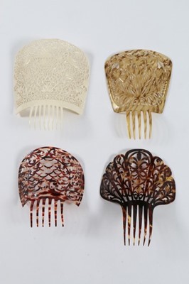 Lot 184 - A good group of headwear and haircombs,...