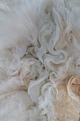 Lot 204 - A John Galliano ivory satin and tousled tulle...