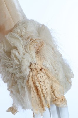 Lot 204 - A John Galliano ivory satin and tousled tulle...
