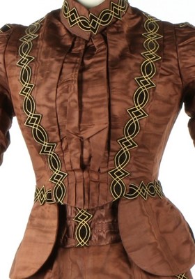 Lot 213 - A brown moire dress, circa 1890, comprising...