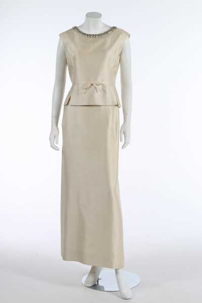 Lot 214 - A Christian Dior ivory silk evening ensemble,...