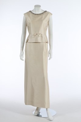 Lot 214 - A Christian Dior ivory silk evening ensemble,...