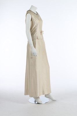 Lot 214 - A Christian Dior ivory silk evening ensemble,...