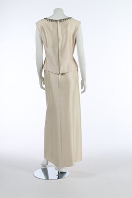 Lot 214 - A Christian Dior ivory silk evening ensemble,...