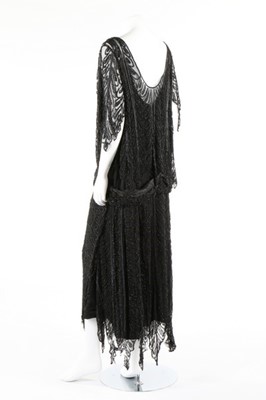 Lot 215 - A Paquin black beaded tulle flapper dress,...