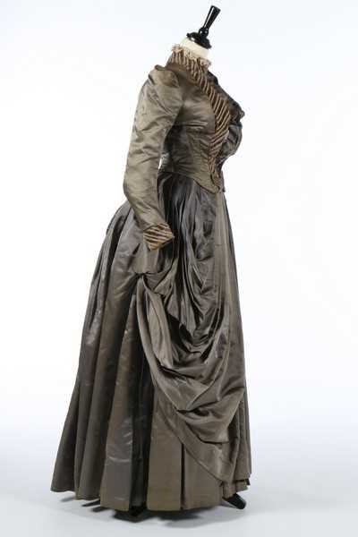 Lot 226 - A striped grey satin dress circa 1890,...