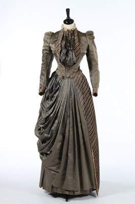 Lot 226 - A striped grey satin dress circa 1890,...