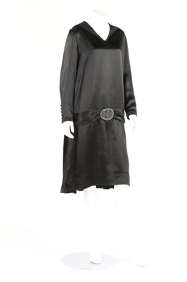 Lot 267 - A black satin dinner dress, circa 1925,...