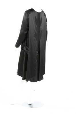 Lot 267 - A black satin dinner dress, circa 1925,...