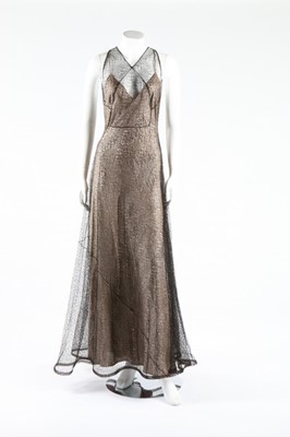 Lot 273 - A cob-web fine black knitted lace evening...