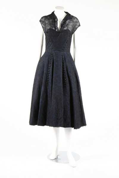 Lot 276 - A Jean Desses couture midnight blue lace...