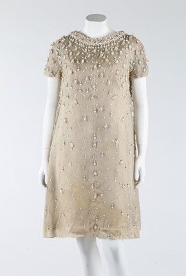 Lot 275 - A Jean Patou couture beaded white organza...