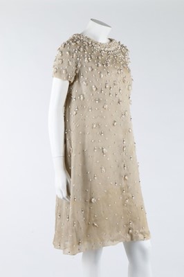 Lot 275 - A Jean Patou couture beaded white organza...
