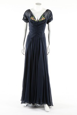 Lot 294 - A Jean Patou couture midnight-blue chiffon...