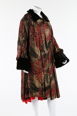 Lot 307 - A stencilled gold lamé opera coat, mid 1920s,...