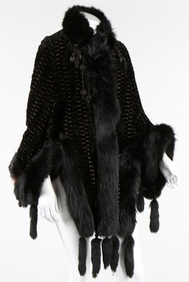 Lot 314 - A voided velvet dolman cape, circa 1885, with...