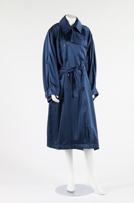 Lot 332 - An Azzedine Alaïa blue satin trench coat,...