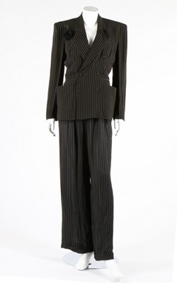 Lot 344 - A Jean-Paul Gaultier pin-striped trouser suit,...