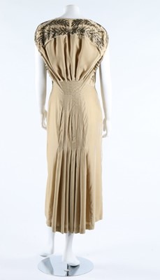 Lot 350 - An Alexander McQueen ivory velvet evening gown,...