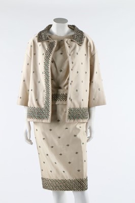 Lot 355 - A Prada ivory silk cocktail suit, 2000s, pale...