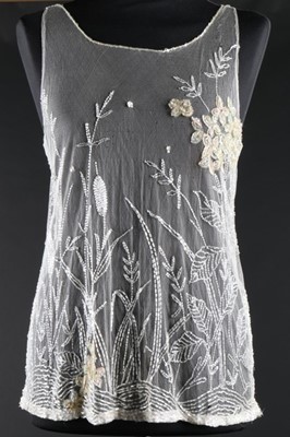 Lot 29 - A beaded and sequined white tulle bodice, late...