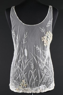 Lot 29 - A beaded and sequined white tulle bodice, late...