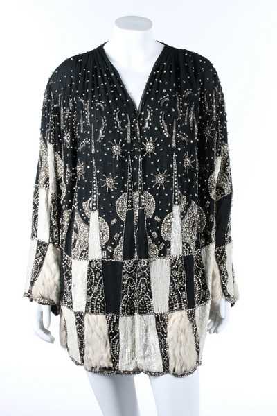 Lot 103 - A beaded and sequined couture evening jacket,...