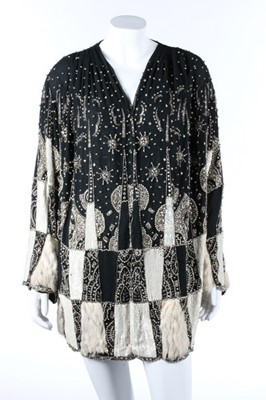 Lot 103 - A beaded and sequined couture evening jacket,...