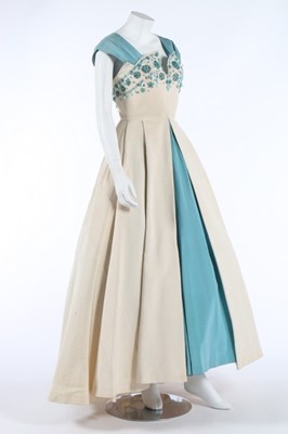 Lot 48 - A Norman Hartnell couture beaded ivory and...