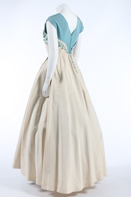 Lot 48 - A Norman Hartnell couture beaded ivory and...
