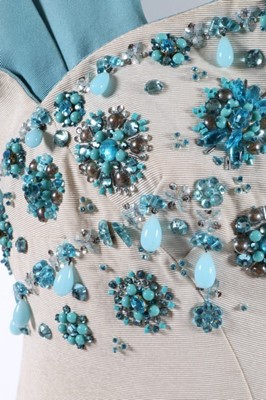 Lot 48 - A Norman Hartnell couture beaded ivory and...
