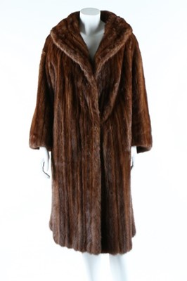 Lot 52 - Two fur coats, 1950s, one of tan fur probably...