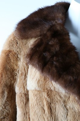 Lot 52 - Two fur coats, 1950s, one of tan fur probably...