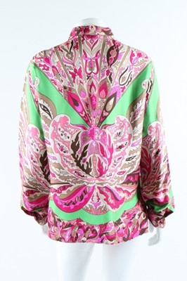 Lot 18 - Two Pucci printed silk blouses, late 1960s,...