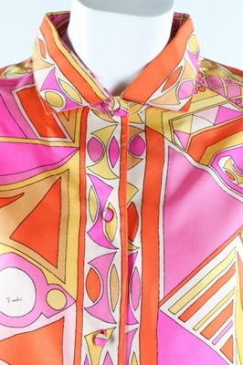 Lot 18 - Two Pucci printed silk blouses, late 1960s,...