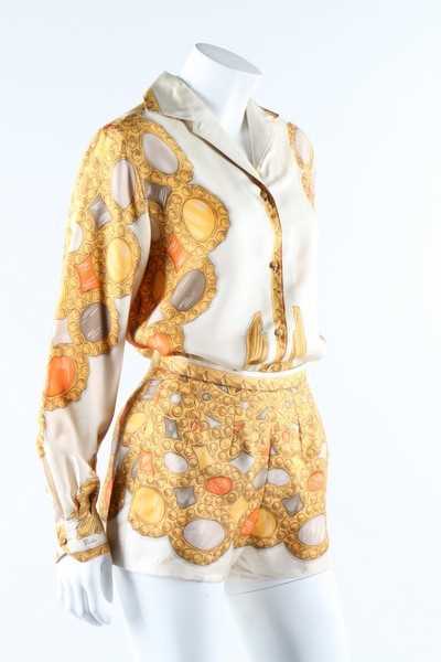 Lot 19 - A Pucci printed silk blouse and matching...