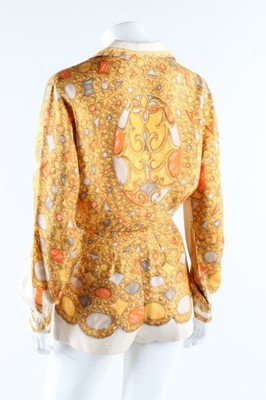 Lot 19 - A Pucci printed silk blouse and matching...