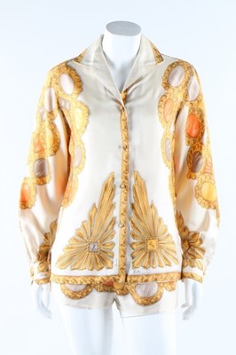 Lot 19 - A Pucci printed silk blouse and matching...